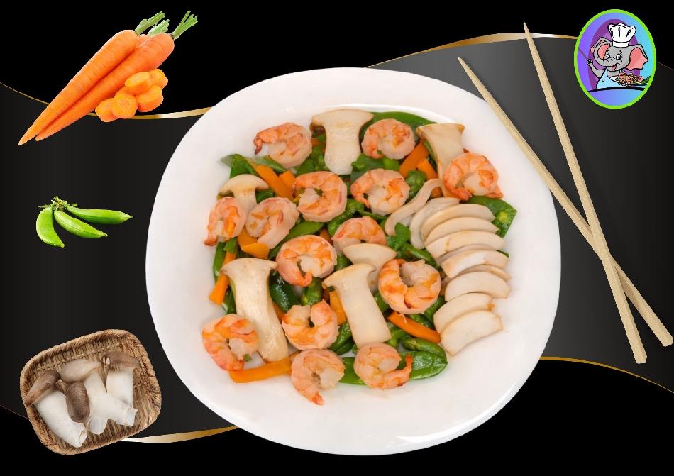 Sauté de crevettes aux champignons eryngii, carottes et pois gourmand